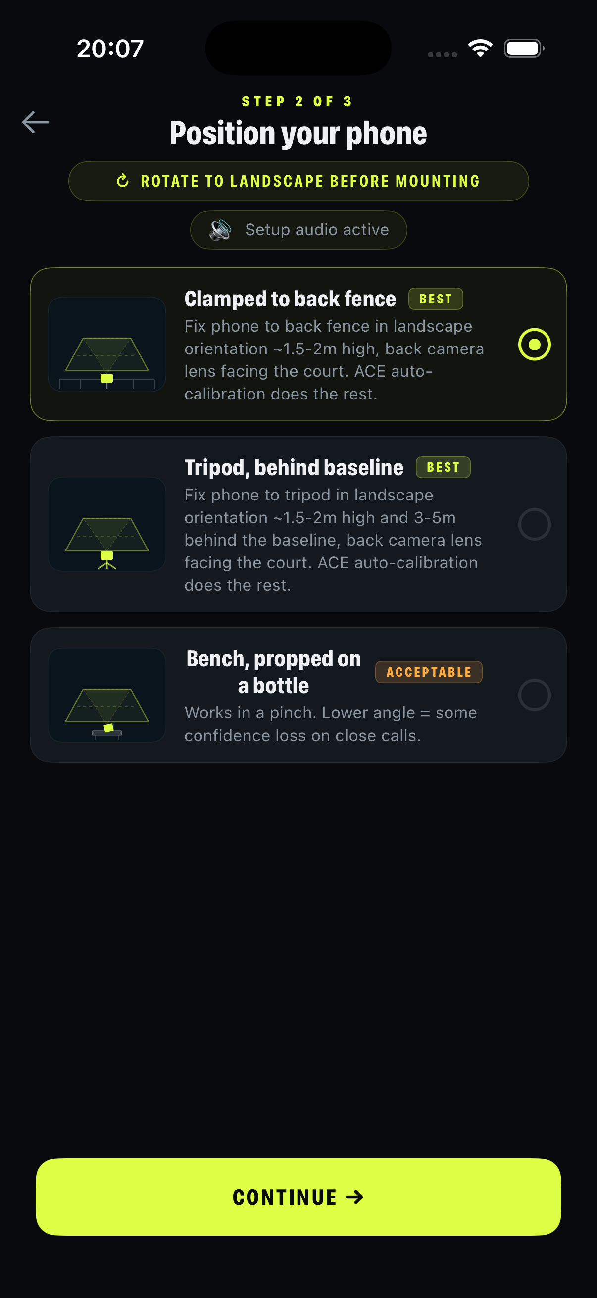 Position your phone — clamped to back fence, tripod behind baseline, or propped on a bench